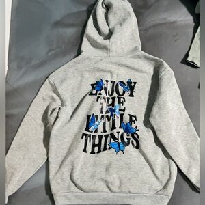 A grey positive saying hoodie size medium
